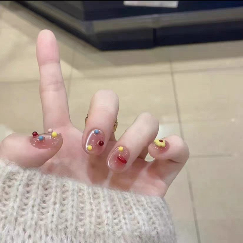 Artificial nails with playful decor Stornfield