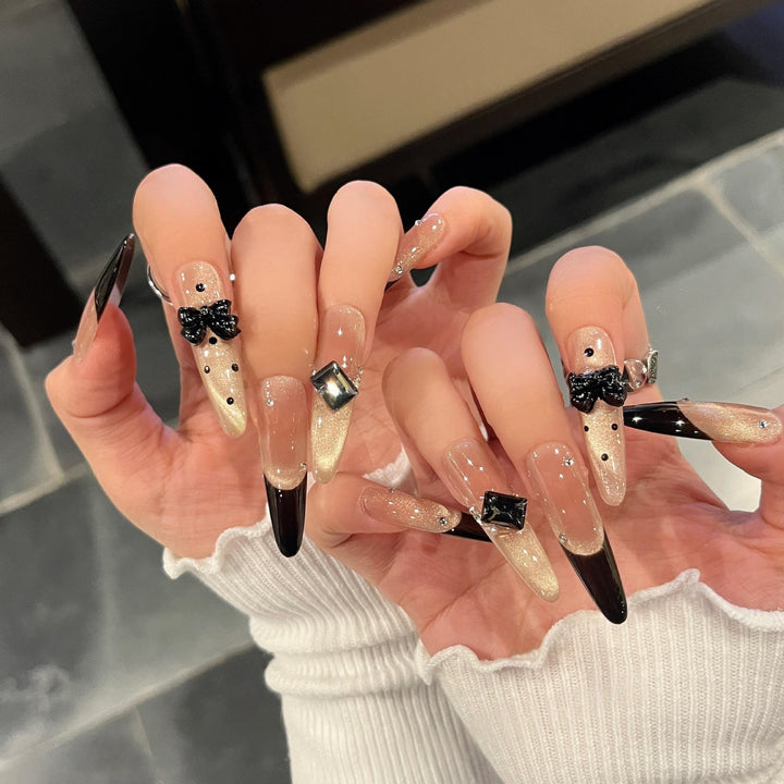 Elegant Kunstnägel with Bow and Rhinestone Design Stornfield