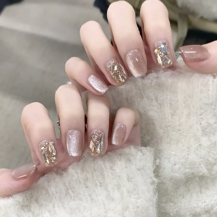 Elegant Nail Art with Shiny Accents Stornfield