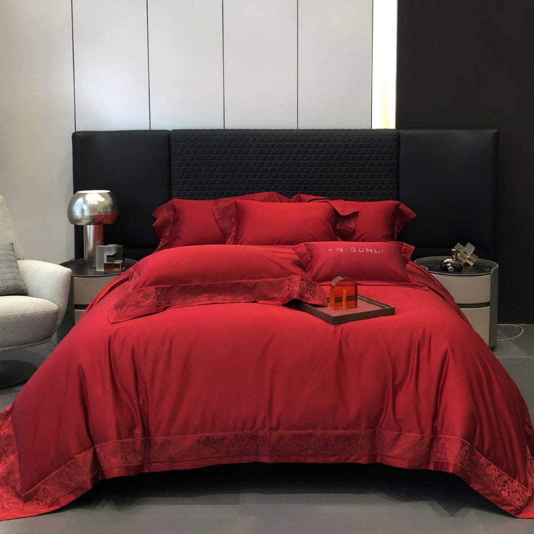 Satin bed linen set with elegant decorative border and gloss finish