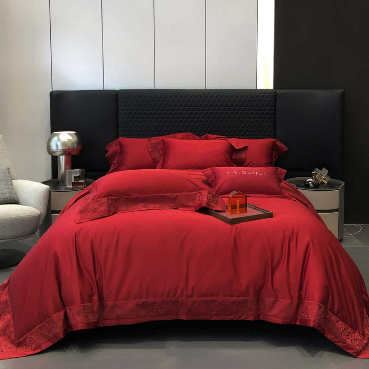 Satin bed linen set with elegant decorative border and gloss finish