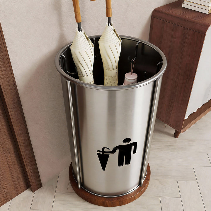 Cylindrical Perforated Metal Umbrella Stand with Raised Legs and Ventilated Mesh Body