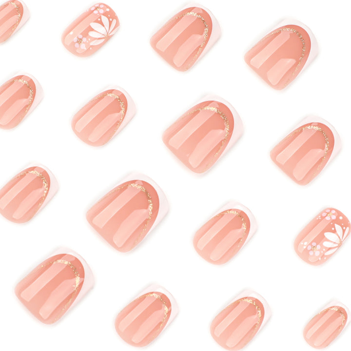 Artistic nail extensions with floral design and elegant accents Stornfield