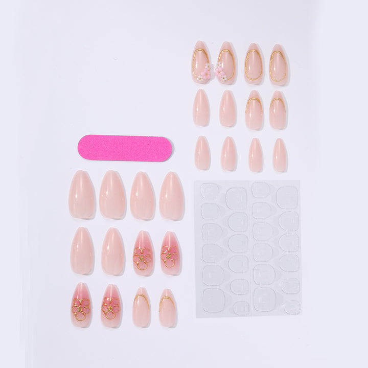 Acrylic nail set with elegant flower and gold decorations Stornfield