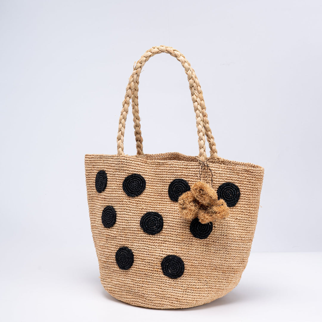 Handcrafted straw bag with eye-catching accents Stornfield