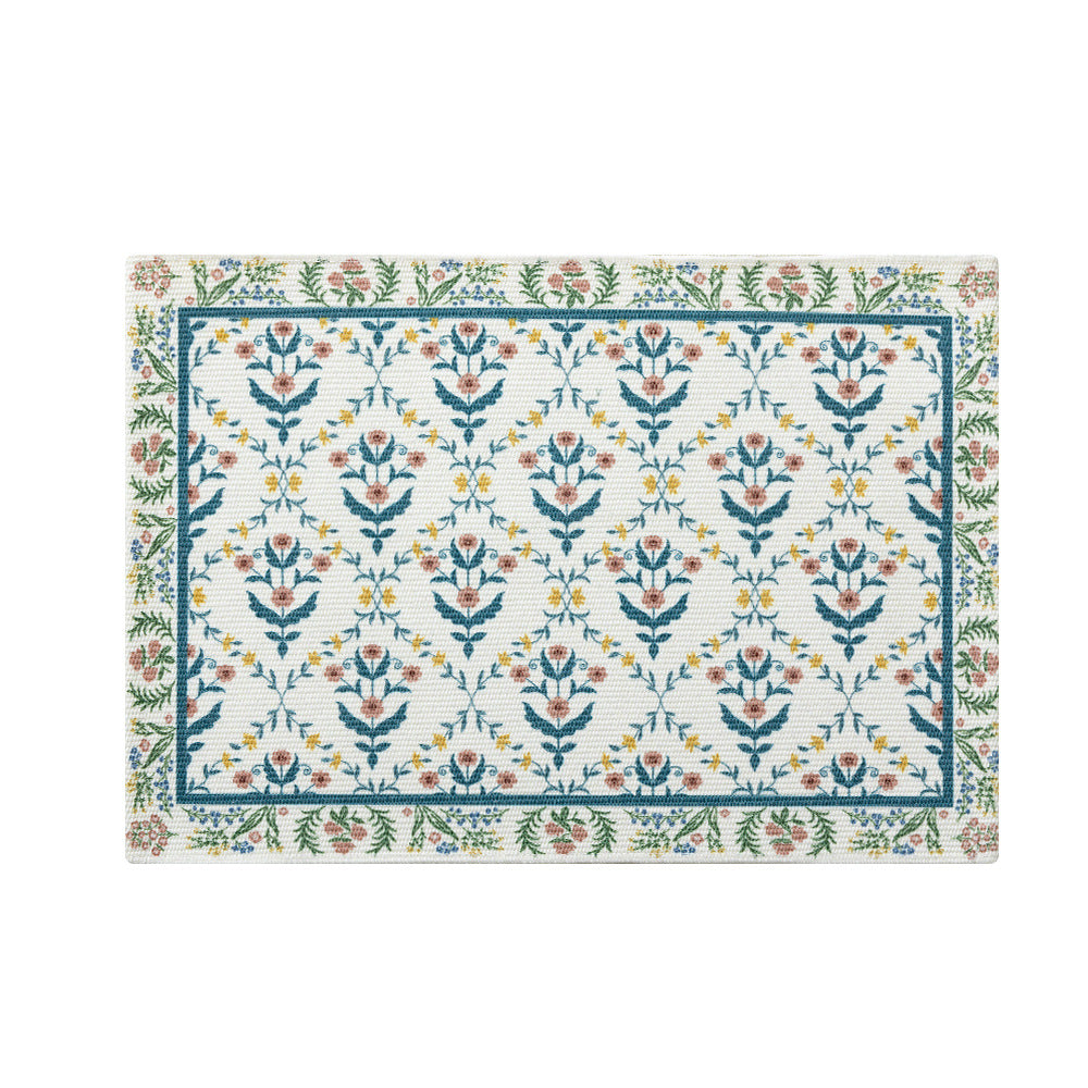 Floral woven bath mat with jacquard structure, absorbent cotton surface and non-slip underside Stornfield
