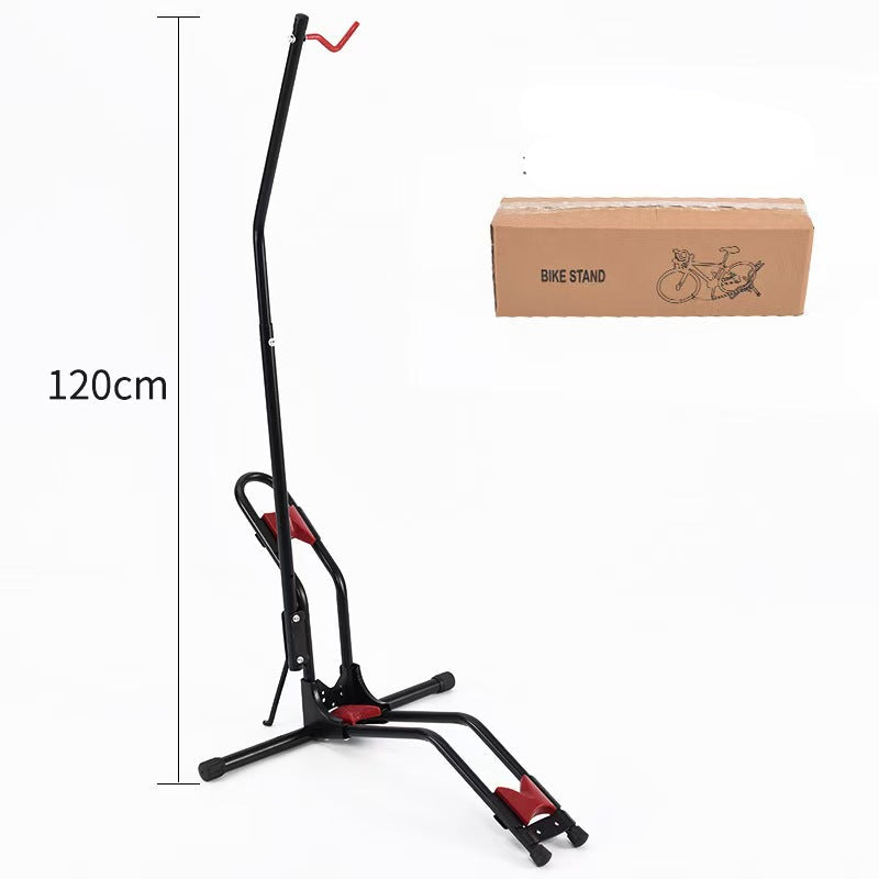 freestanding vertical bicycle repair and display stand with front wheel clamp and foldable tripod base Stornfield