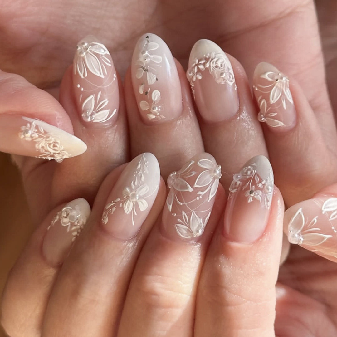 Premium Nail Art with Floral Design and Glittering Accents Stornfield