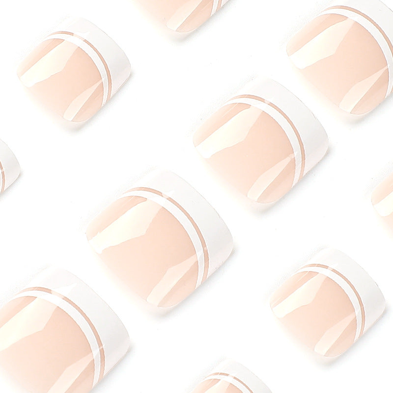 Artful toenail art with elegant French tip design Stornfield