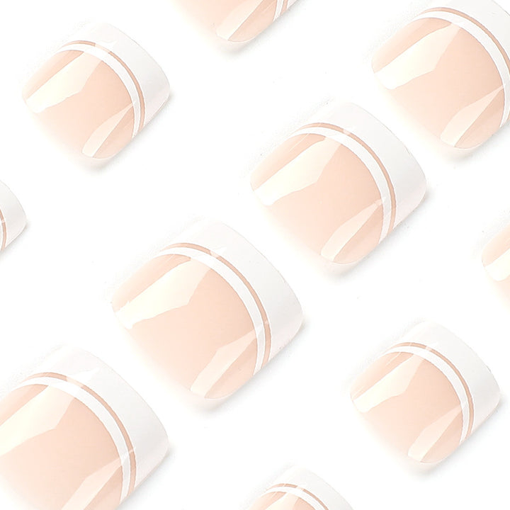 Artful toenail art with elegant French tip design Stornfield