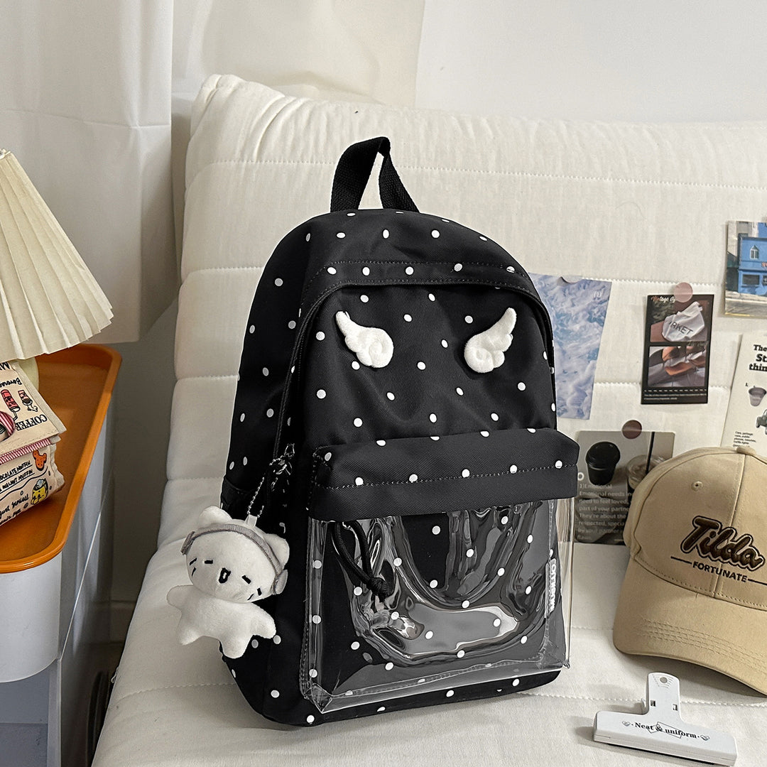 Polka Dot Patterned Backpack with Playful Wing Accents Stornfield