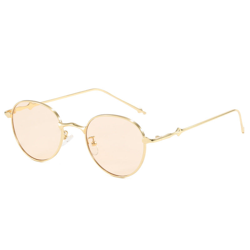 Ladies elegant round sunglasses with stylish metal frame Stornfield