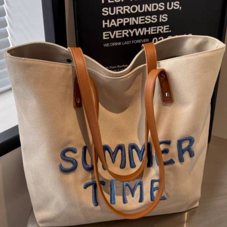 Beach bag with embroidered summer motif Stornfield