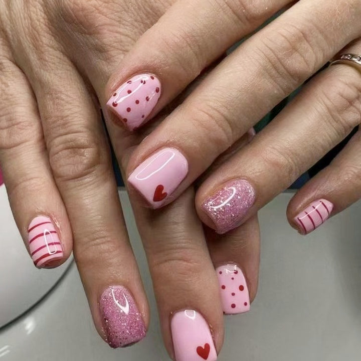 Artificial nail set with romantic heart motifs and sparkling accents Stornfield