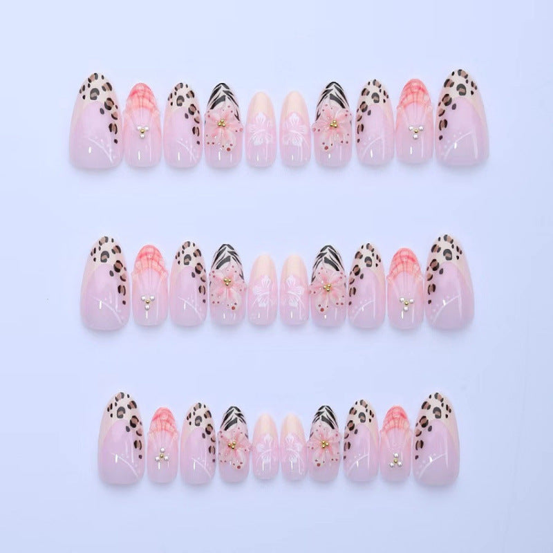 Artificial nail set with floral decorations and elegant patterns Stornfield