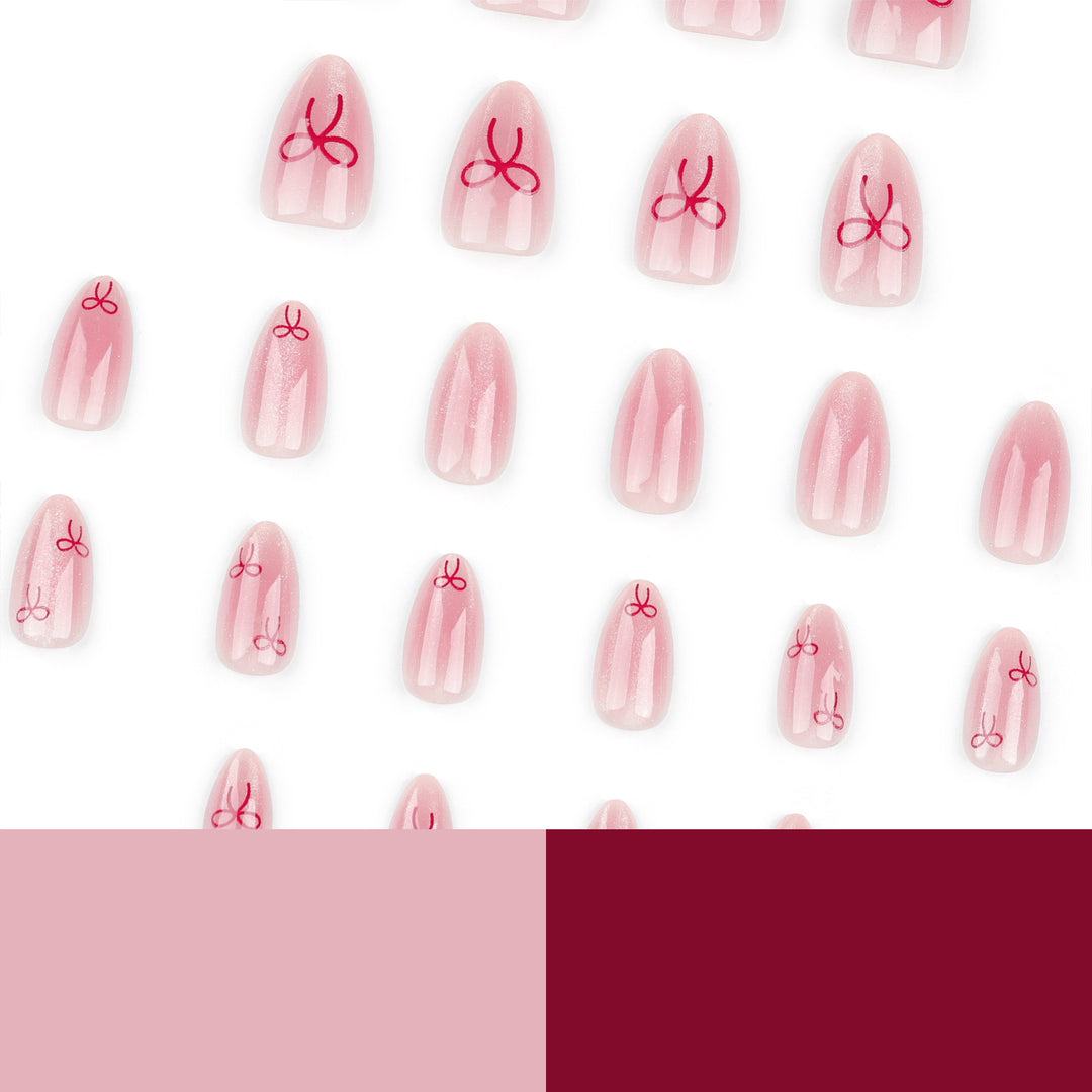 Artificial Nail Art with Bow Motif Stornfield