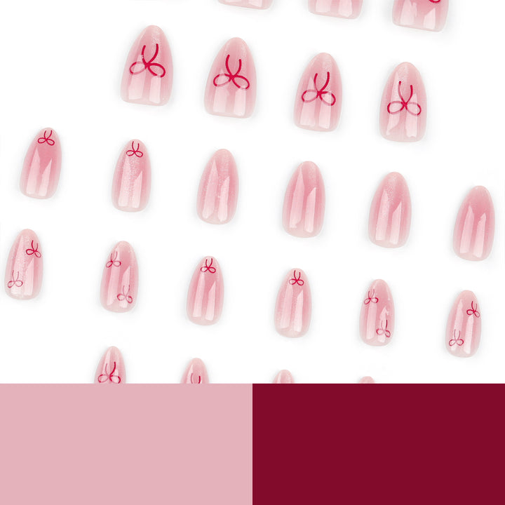 Artificial Nail Art with Bow Motif Stornfield