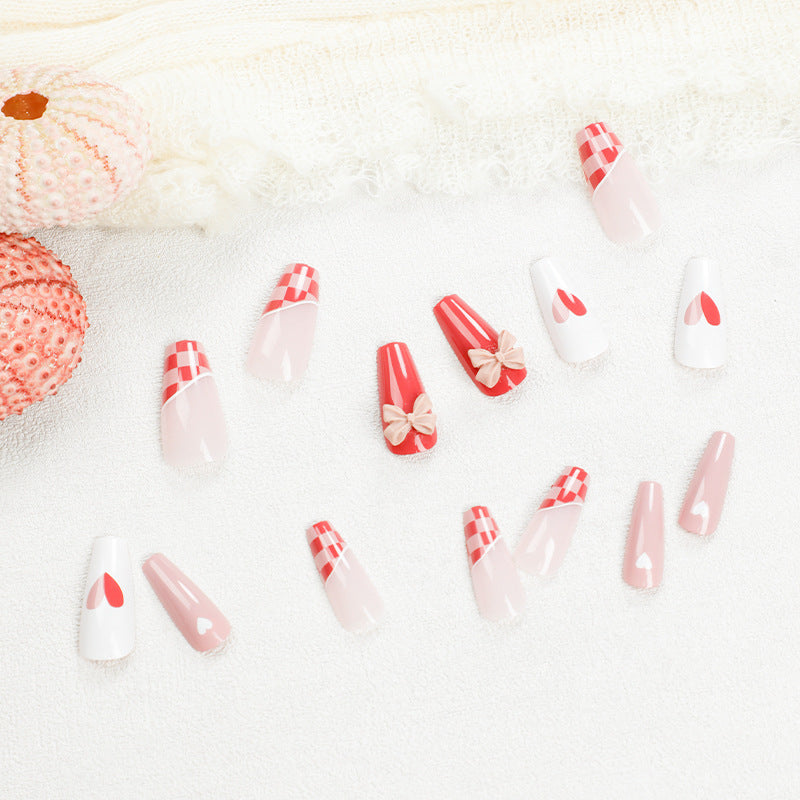 Artful nail extensions with playful designs and romantic accents Stornfield
