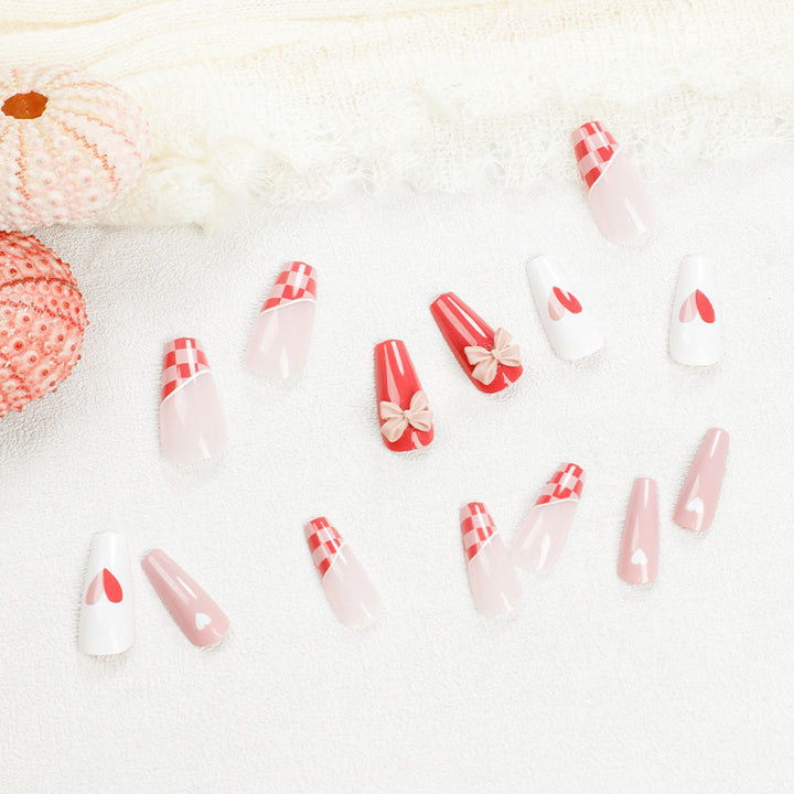 Artful nail extensions with playful designs and romantic accents Stornfield