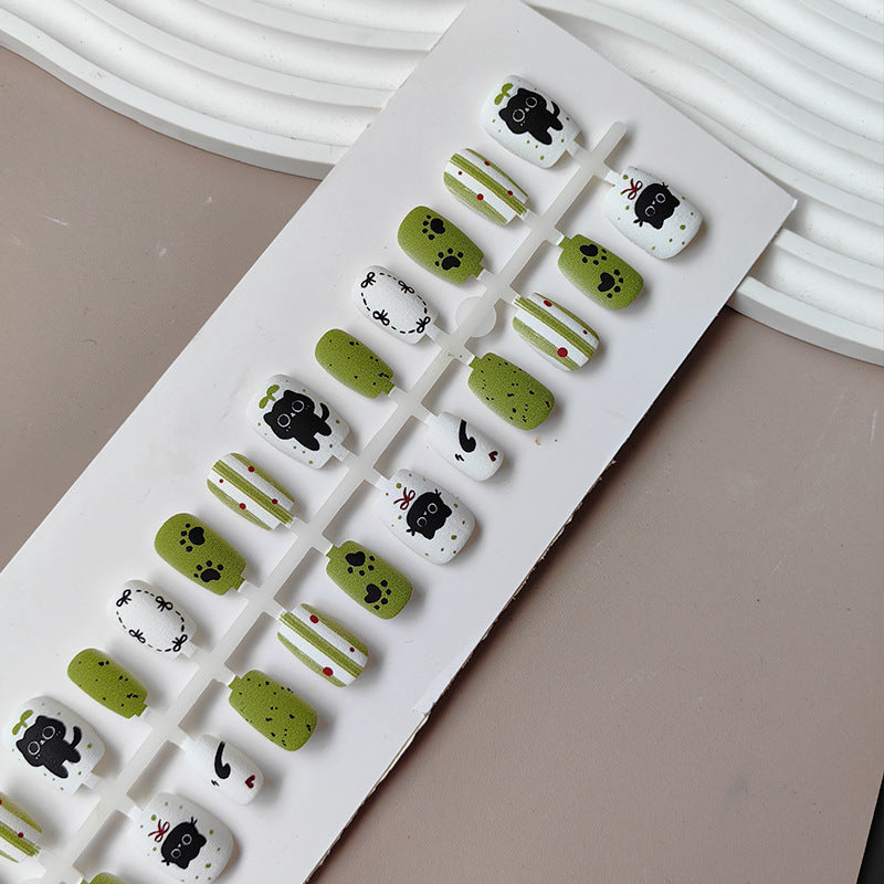 Creative art press-on nails with playful animal design Stornfield