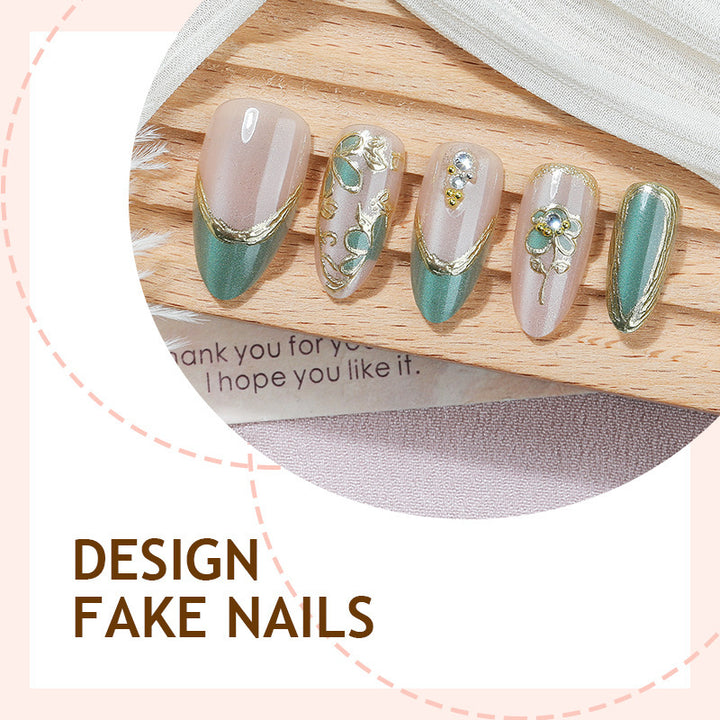 Artificial nail set with luxurious flower appliqués and glitter accents Stornfield