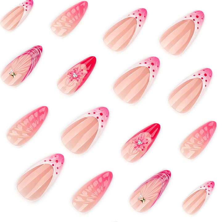 Artful stiletto nails with floral design and glitter accents Stornfield