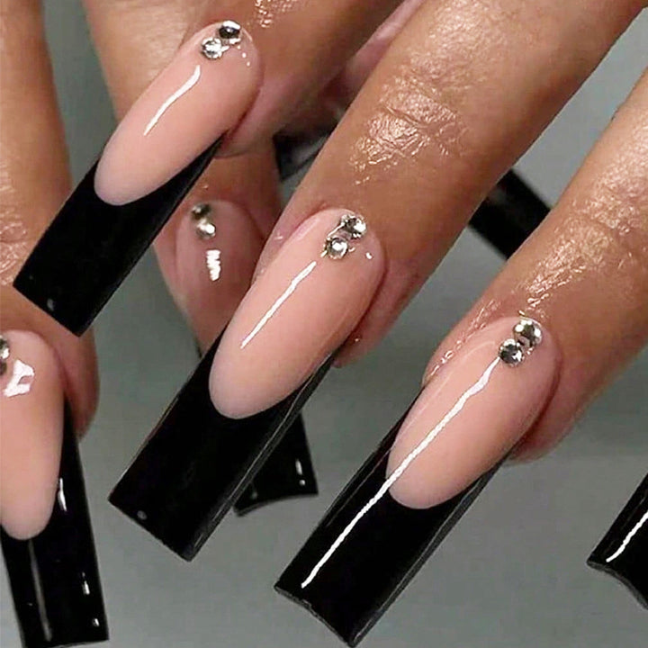 Artificial nails with glitter and elegant accents Stornfield