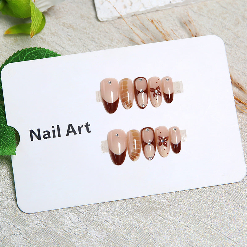 Artificial nails with elegant motif designs Stornfield