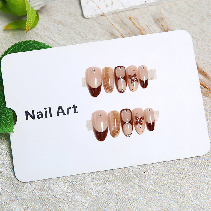 Artificial nails with elegant motif designs Stornfield