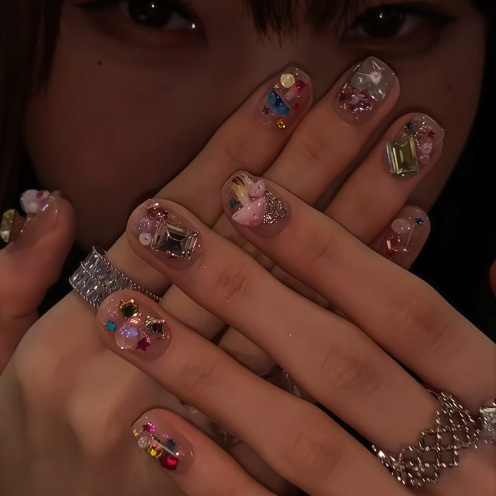 Artificial nails with sparkling crystal accents Stornfield