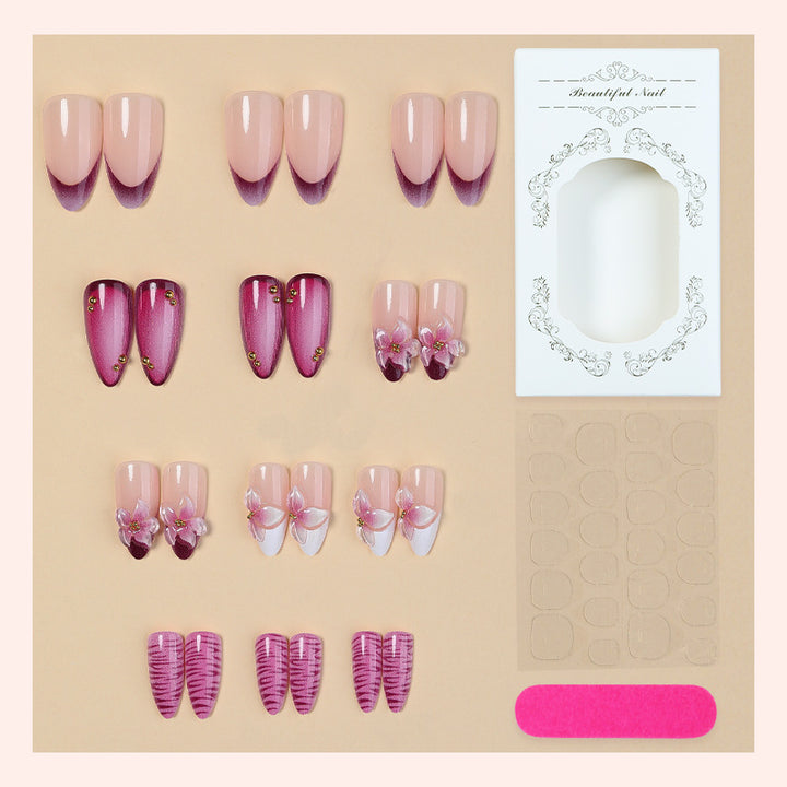 Artificial nail set with floral accents and ombre effect Stornfield