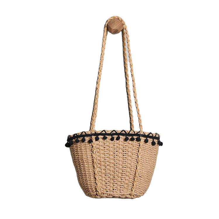 Delicate beach bag with pompons Stornfield