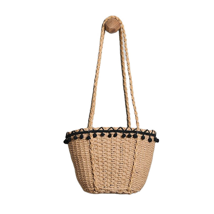 Delicate beach bag with pompons Stornfield