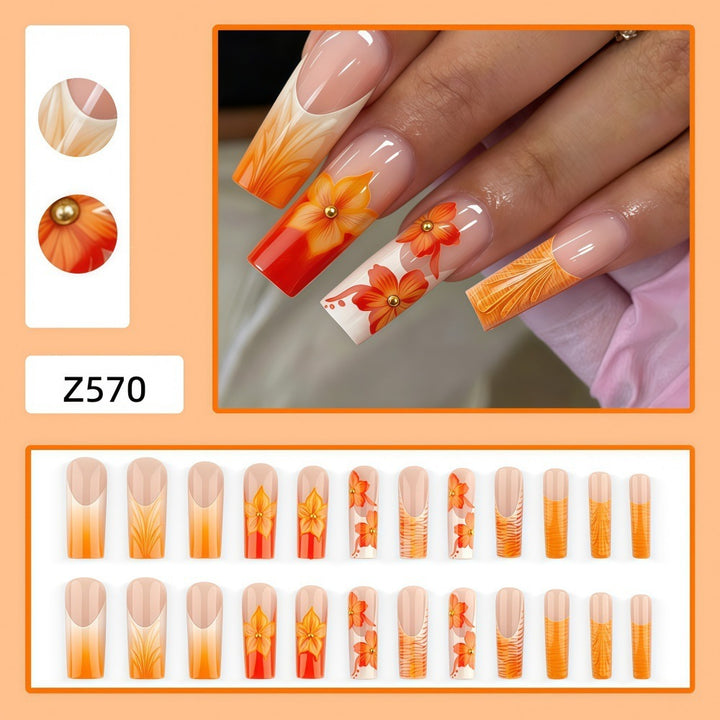 Nail art with floral accents and glitter Stornfield