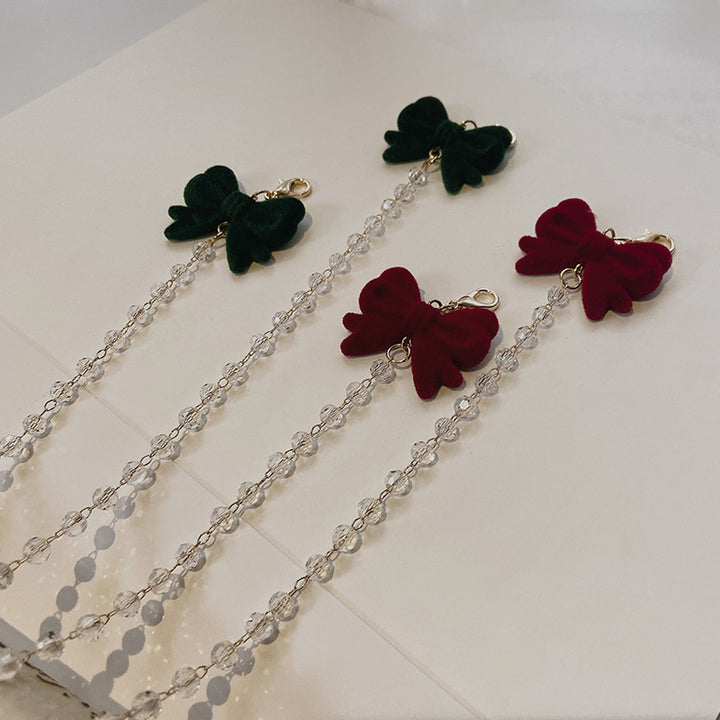 Jewelry holder chain with velvet bow pendant Stornfield
