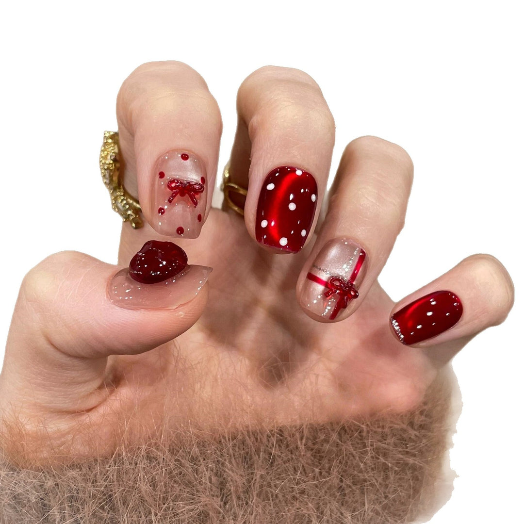Artificial nails with festive gift design Stornfield