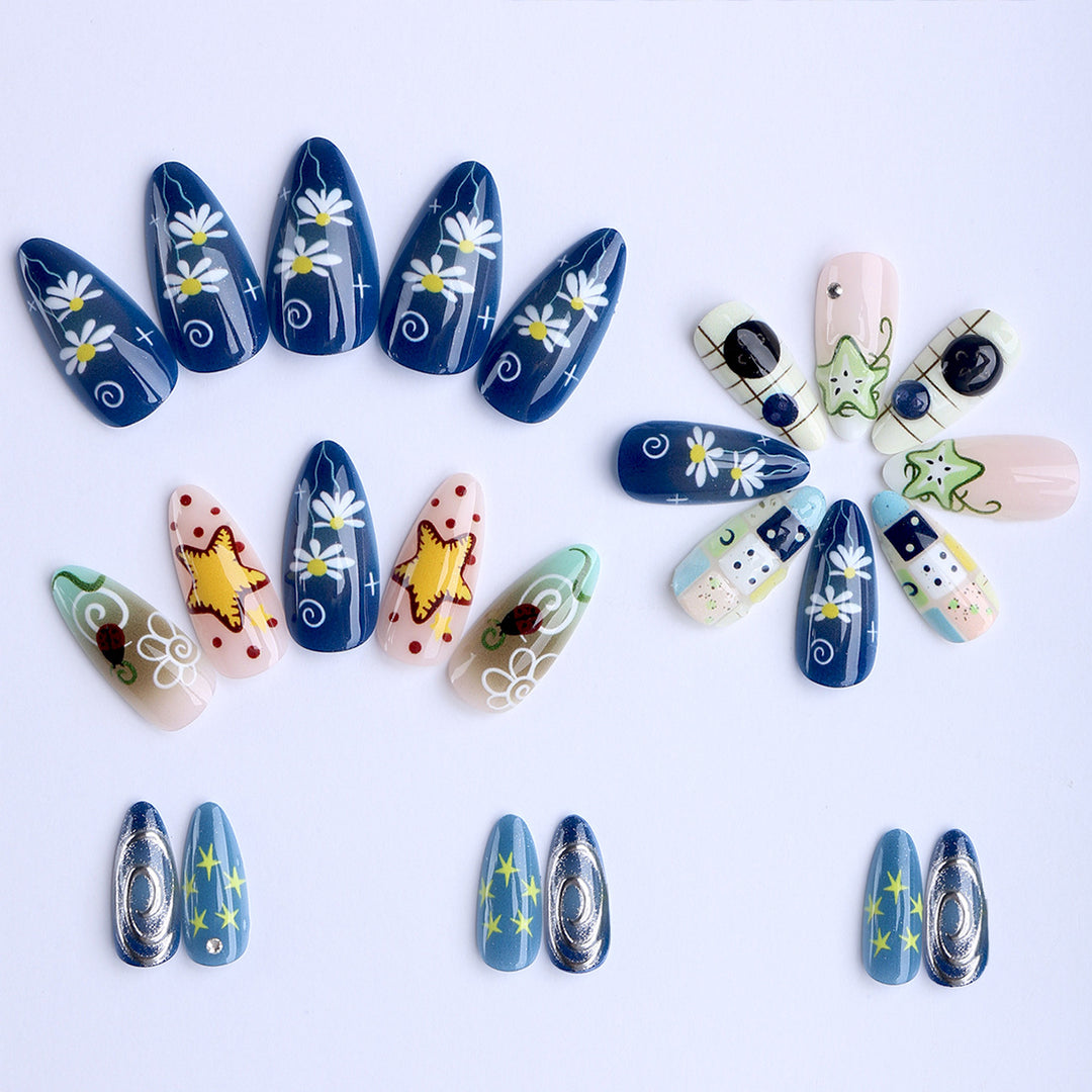 Artificial nails with creative maritime designs and 3D elements Stornfield