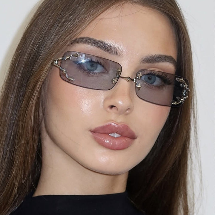 Women's fashionable sunglasses with delicate metal frame and transparent lenses Stornfield