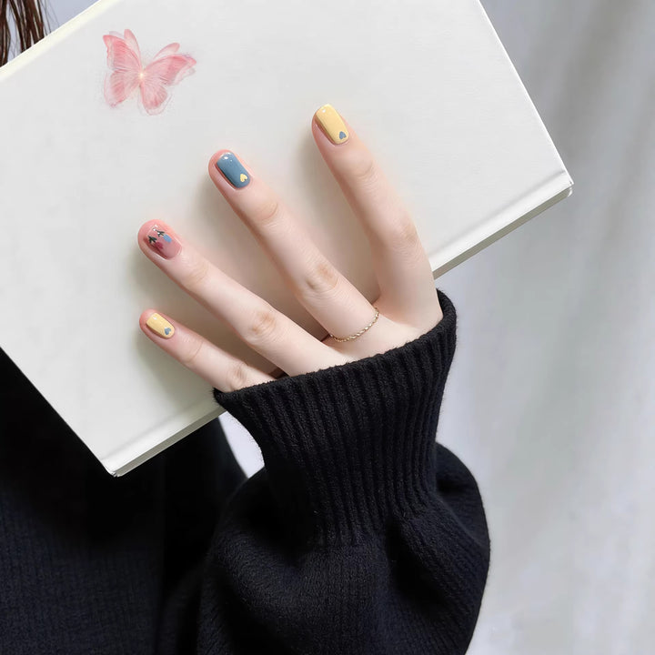Artistic Press-On Nail Set with Creative Patterns
