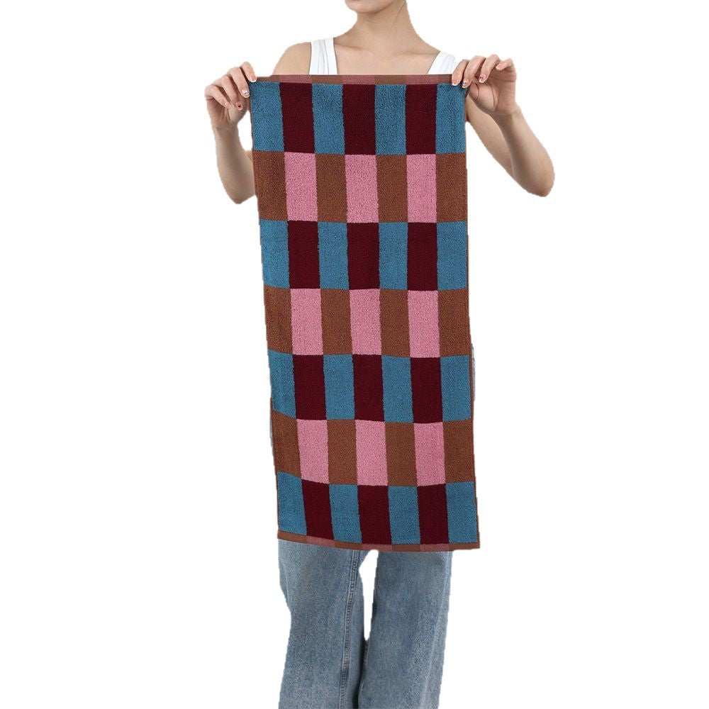 Soft terry hand and bath towel set made of cotton with geometric check pattern