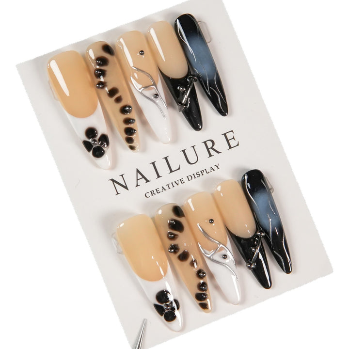 Artistic Stiletto Press-On Nails with Unique Patterning