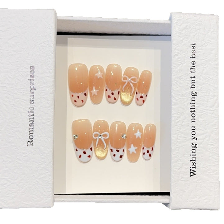 Artificial nails with decadent design and romantic accents Stornfield