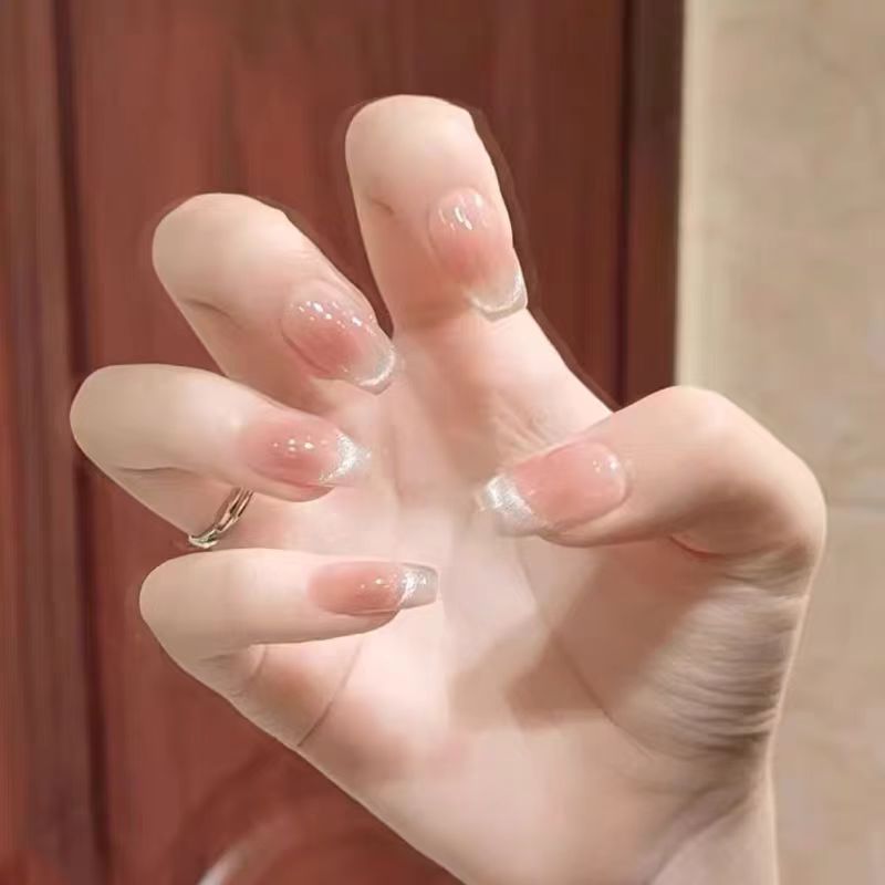 Elegant Artificial Nails with Sparkling Glitter and French Tip Design Stornfield