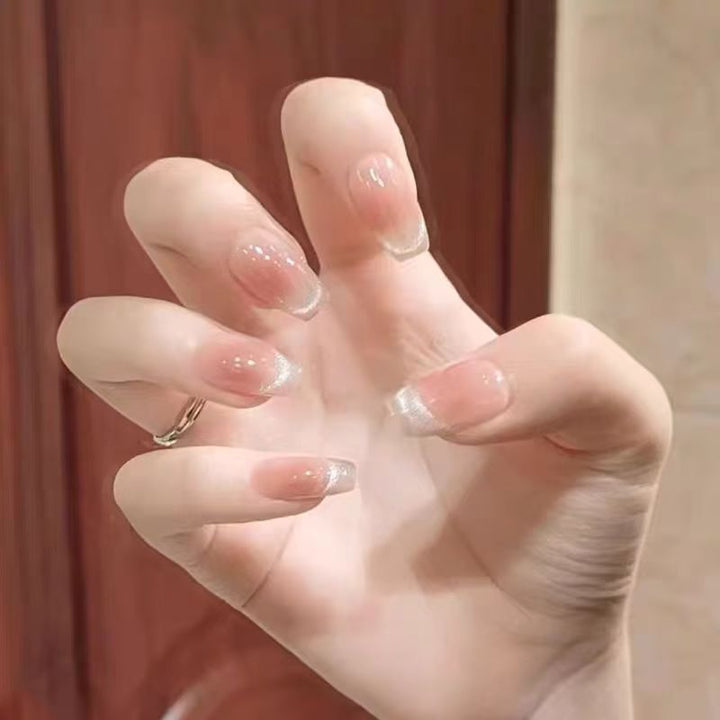 Elegant Artificial Nails with Sparkling Glitter and French Tip Design Stornfield