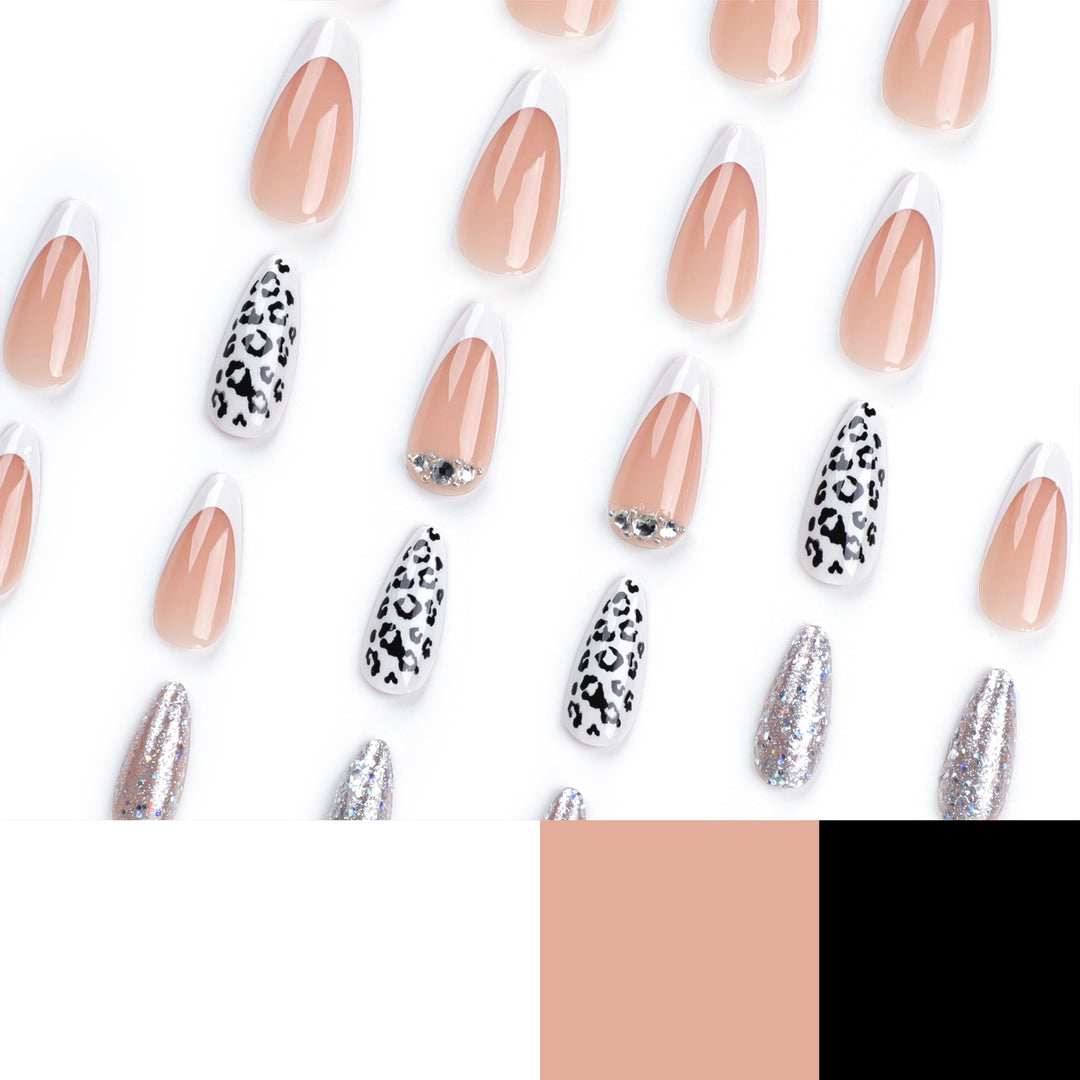 Artful stiletto nails with leopard patterns and glitter accents Stornfield