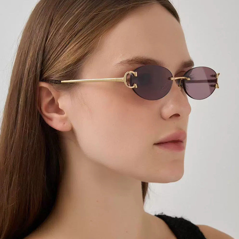 Women's elegant oval-shaped sunglasses with fashionable metal frame Stornfield