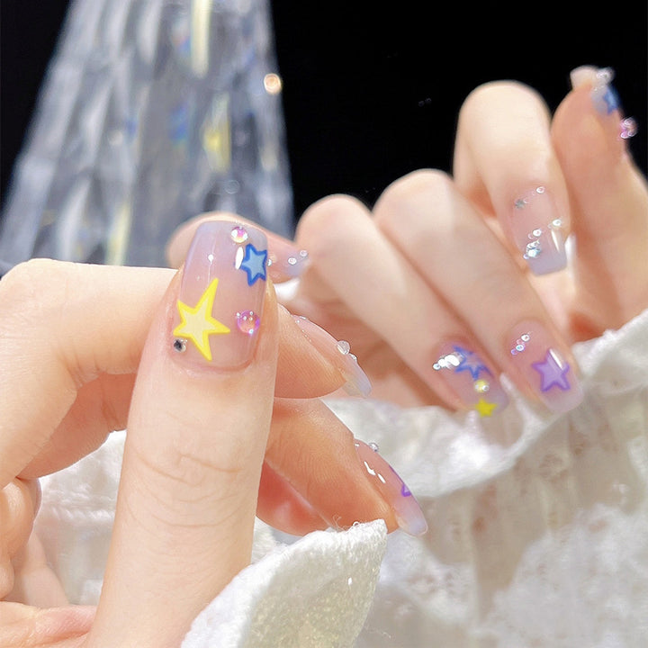 Artificial nail set with elegant blooming decorations and delicate ombre effect Stornfield
