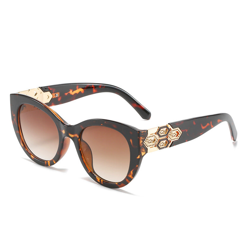 Fashion-Forward Cat-Eye Sunglasses with Decorative Accents Stornfield