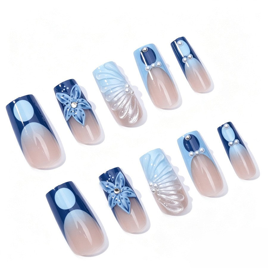 Artificial nail set with floral and elegant decorations Stornfield