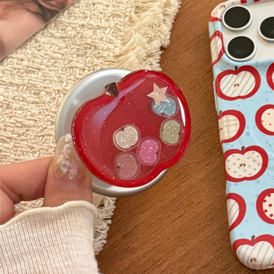 Funnier apple motif smartphone finger holder Stornfield